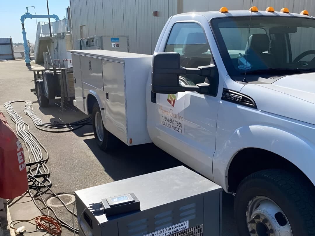 PowerGen service truck and load bank testing equipment on site